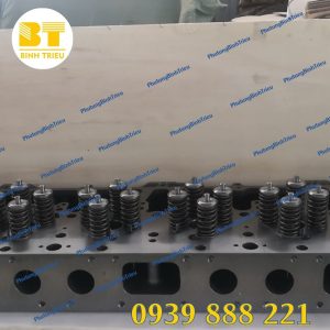 Nắp quy lát động cơ Cat C12